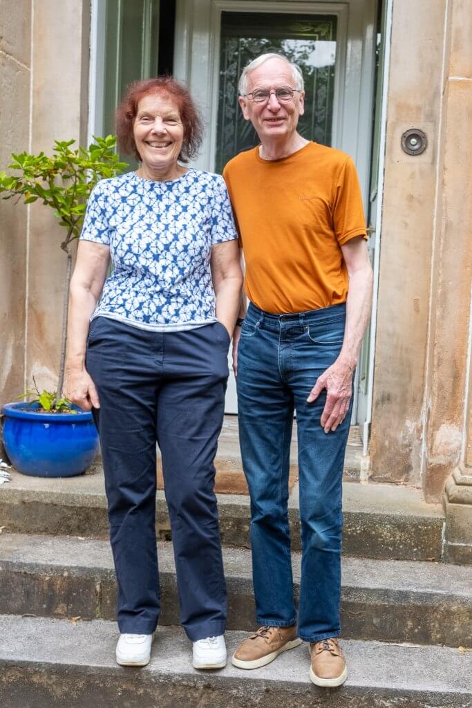 couple in glasgow in shawlands with their retrofitted home happy loco home customers couple in their 40s