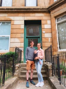 couple with baby outside home in Scotland