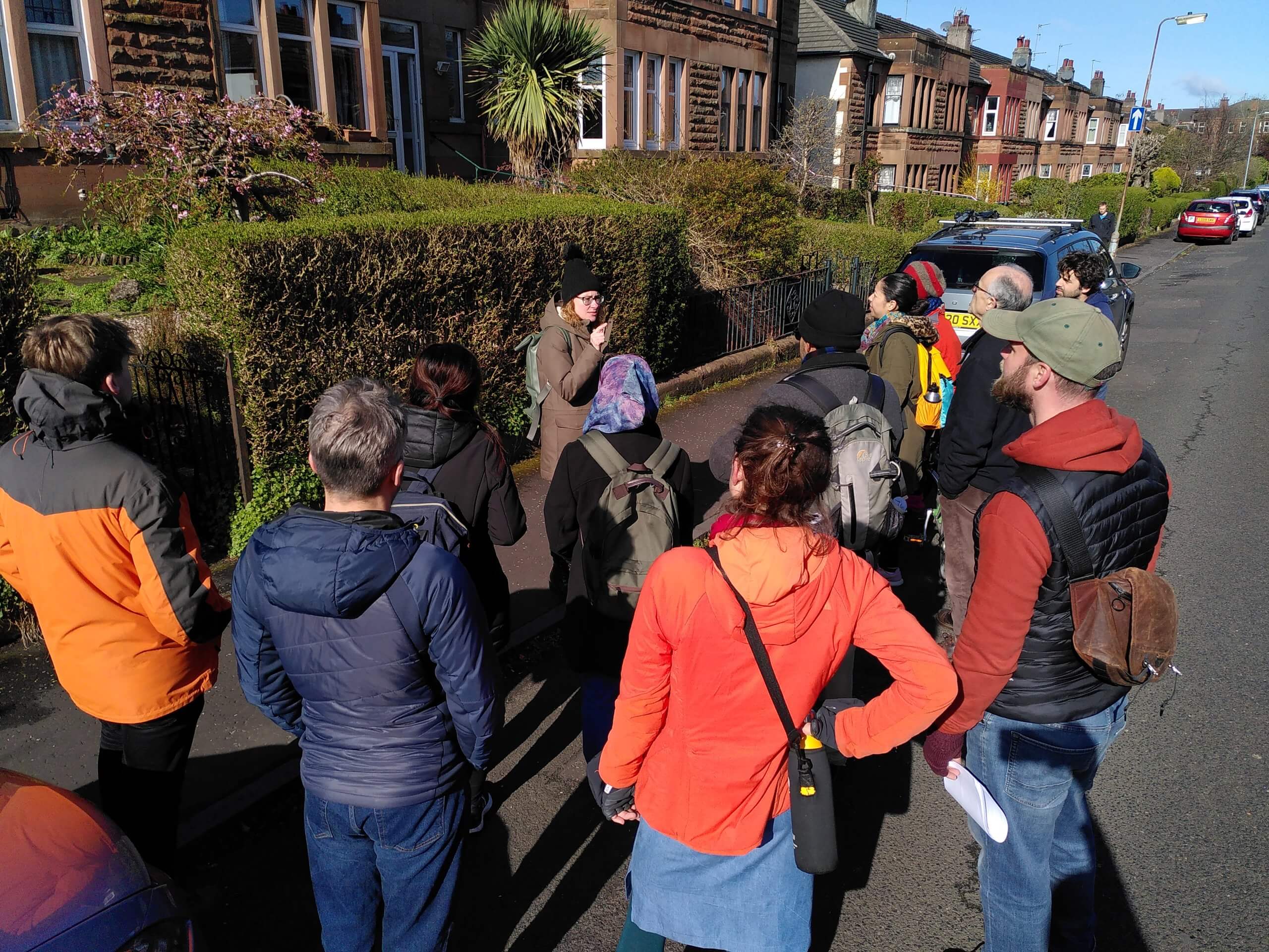 Attendees at the Loco Home general meeting listen to a speaker addressing the room.