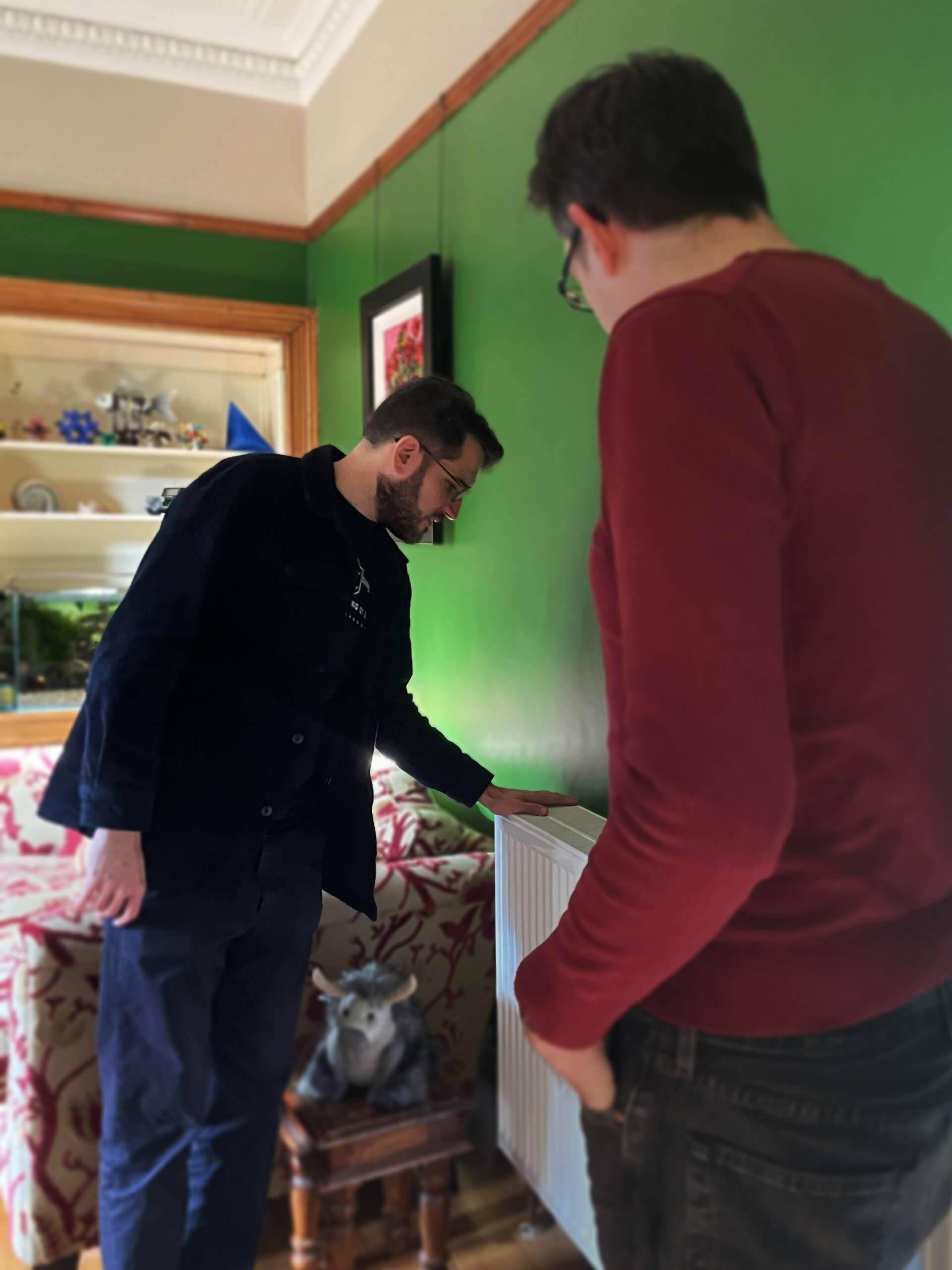 Paul Sweeney MSP inspecting radiator